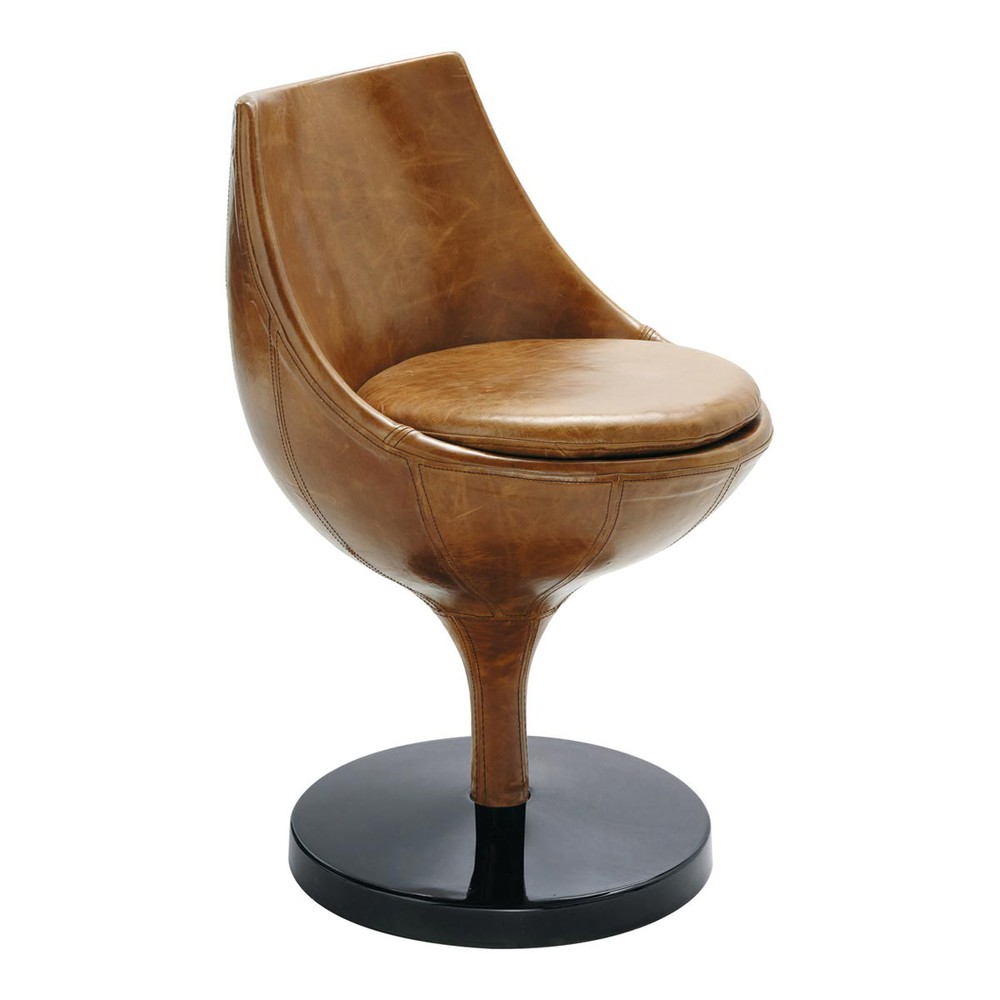 los años 60 con el sillón vintage de cuero marrón claro Polaris los años 60 con el sillón vintage de cuero marrón claro Polaris